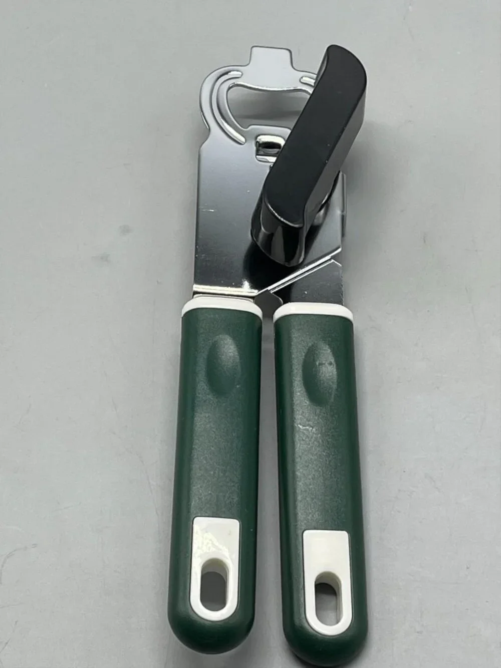 Metal hand crank can opener and bottle opener green and white plastic new READ